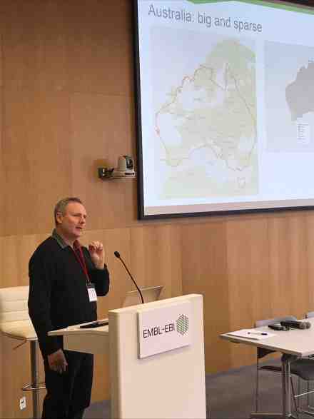 Photograph of Andrew Lonie from Bioplatforms Australia delivering a talk on his visit to the ELIXIR Hub at EMBL-EBI, Hinxton, UK.